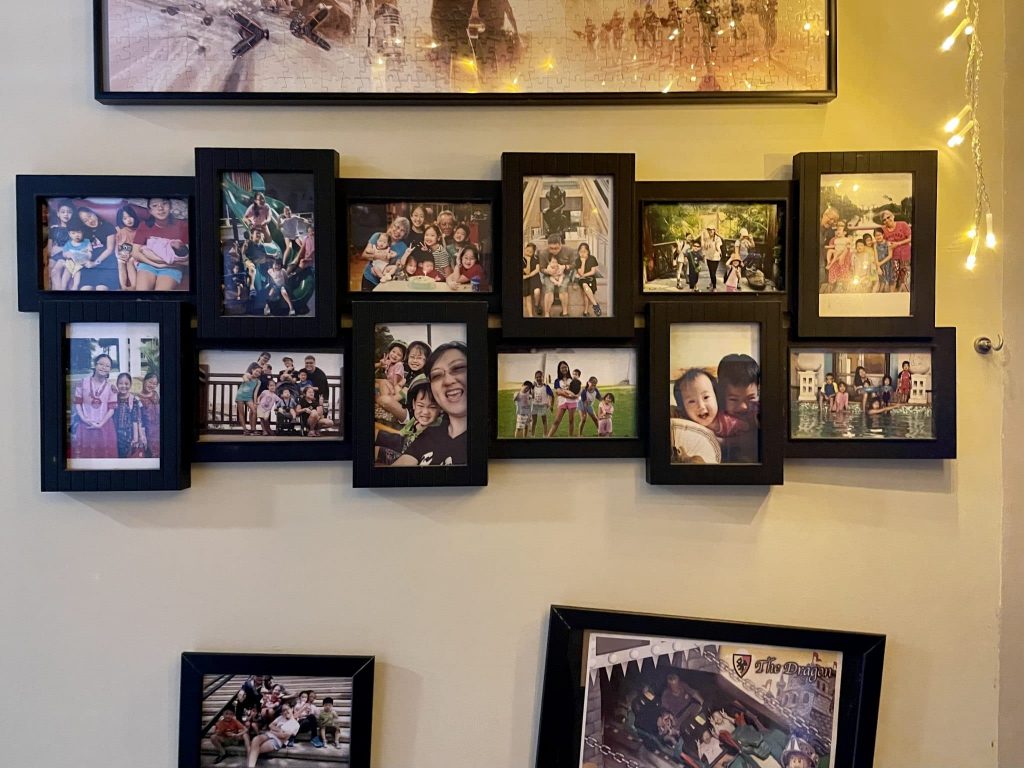The Sees' beautifully crowded wall of family photos.