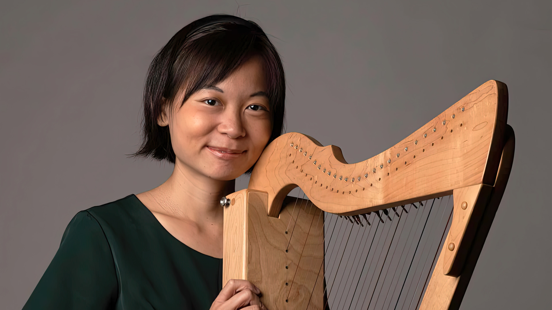 She once disliked music. But a dream of a hedgehog led her to play the harp to help others heal